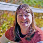 Photo showing Jenni Godfrey, DVM with her dog.